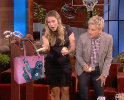 Kristen Bell holding a pink bag featuring a sloth design on Ellen's show.